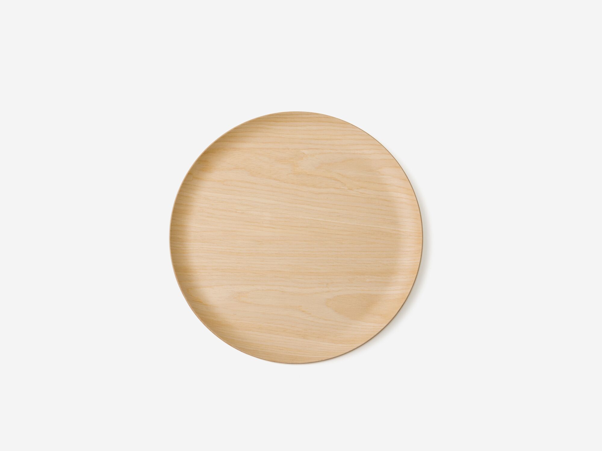 Top view of small round oak serving tray